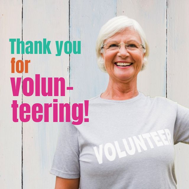 Happy senior woman dressed in a volunteer shirt, beaming with a bright smile. Celebrates appreciation of volunteers, perfect for promoting volunteer programs, senior community engagement, and expressions of gratitude towards volunteers.