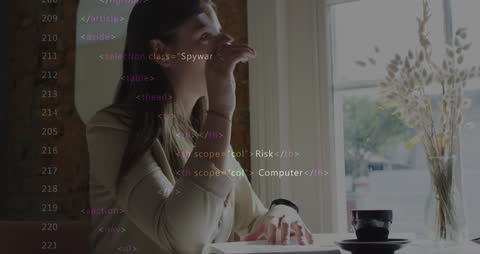 Caucasian Businesswoman Analyzing Data in Bright Cafe