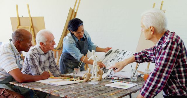 Art Instructor Guiding Senior Students During Drawing Class - Download Free Stock Images Pikwizard.com