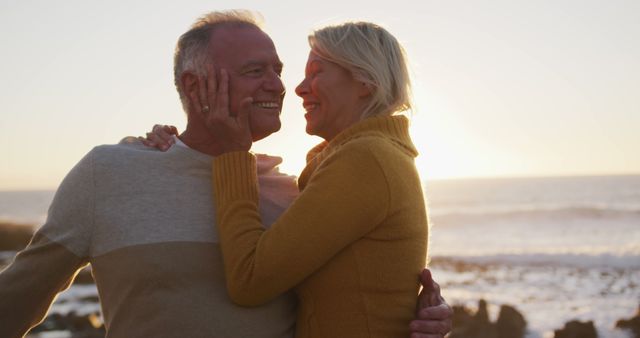 Happy Senior Couple Embracing at Sunset Beach - Download Free Stock Images Pikwizard.com