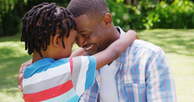 Father and Son Embracing Outdoors in Garden Setting - Download Free Stock Images Pikwizard.com