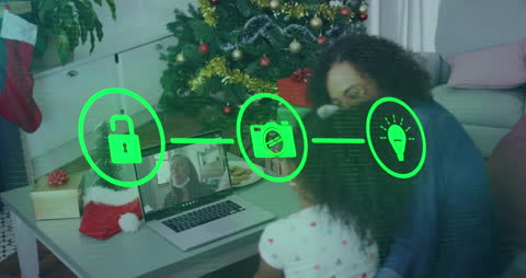 Mother and Child Video Calling at Christmas with Home Automation Graphics