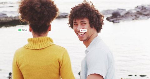 Couple Enjoying Serene Beach Moments Together at Sunset