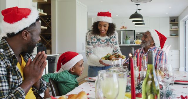 Happy Family Enjoying Christmas Dinner Together in Modern Kitchen - Download Free Stock Images Pikwizard.com