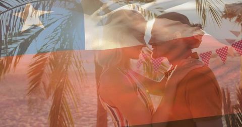 Romantic beach sunset kiss with flag overlay