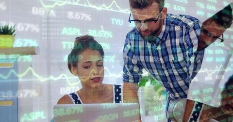 Team of Analysts Analyzing Financial Data with Digital Overlay