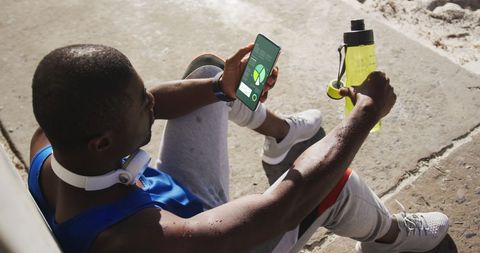 Athlete Monitoring Smartphone Fitness App Performance - Download Free Stock Images Pikwizard.com