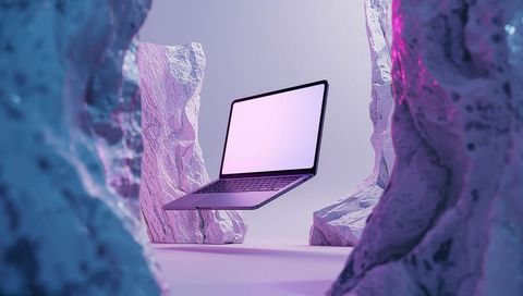 Futuristic floating laptop between abstract stone pillars