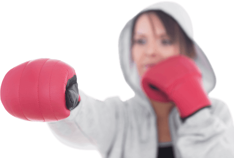 Young woman punching in boxing stance with transparent background