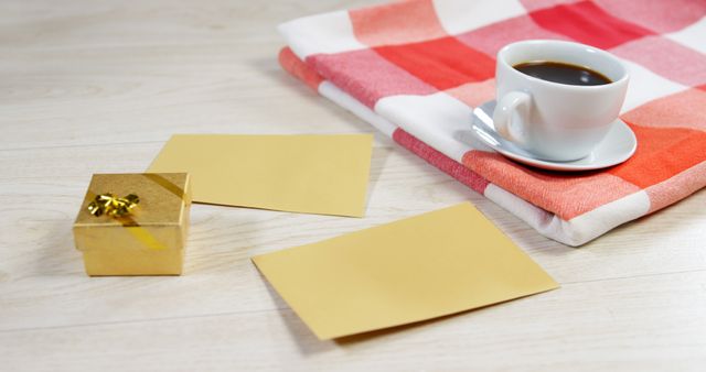 Close-Up of Coffee Cup and Gift Box with Blank Cards on Wooden Table - Download Free Stock Images Pikwizard.com