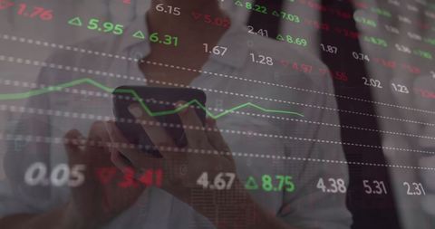 Woman Analyzing Financial Stock Data on Smartphone in Office