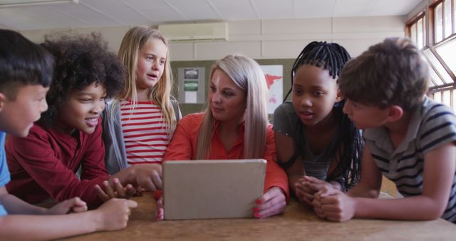 Teacher and Diverse Students Learning with Tablet in Classroom - Download Free Stock Images Pikwizard.com