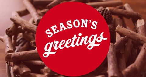 Season's Greetings Overlay on Festive Holiday Decorations