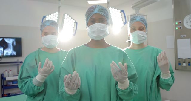 Three Surgeons Prepared for Surgery in Operating Room - Download Free Stock Images Pikwizard.com