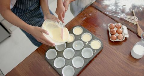 Mother and Daughter Baking Cupcakes at Home Together - Download Free Stock Images Pikwizard.com