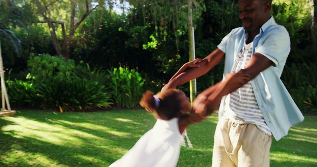 Happy Father and Daughter Playing Outdoors in Garden - Download Free Stock Images Pikwizard.com