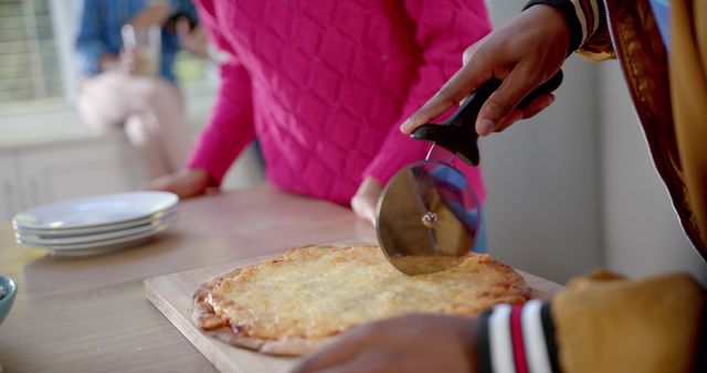 Cutting Freshly Baked Pizza on Wooden Board - Download Free Stock Images Pikwizard.com