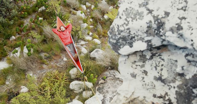 Climber Relaxing in a Hammock on a Rock Face Enjoying Nature - Download Free Stock Images Pikwizard.com