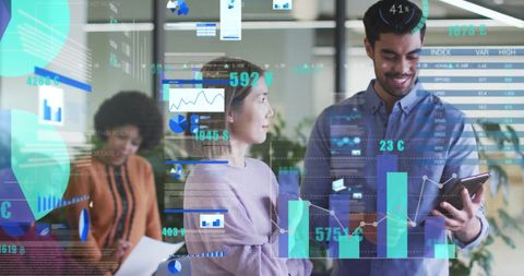 Diverse Team Analyzing Digital Data on Tablet in Modern Office Environment - Download Free Stock Images Pikwizard.com