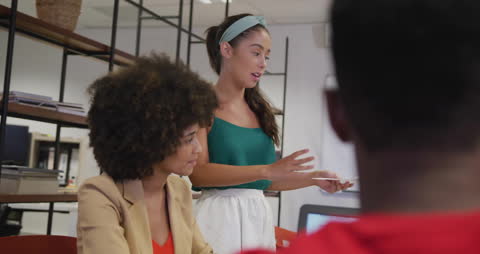 Diverse Creative Team Collaborating in Office Setting