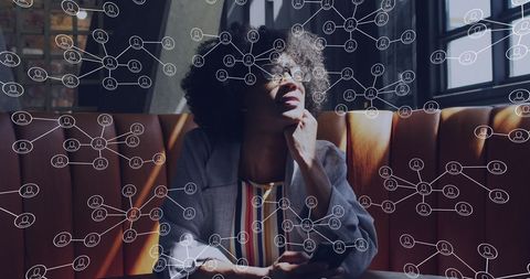 Thoughtful Professional Visualizes Digital Networking Concepts