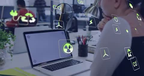 Professional Analyzing Energy Holographs on Laptop in Modern Office