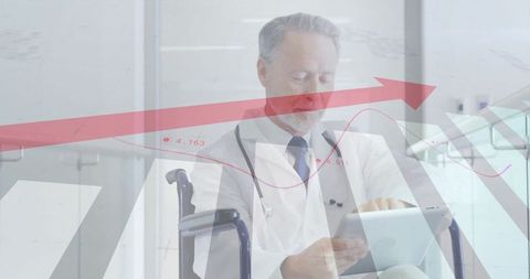 Senior Doctor Using Tablet with Graph Overlay in Modern Hospital