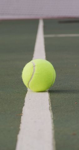 Yellow Tennis Ball on Court Line under Blue Sky - Download Free Stock Images Pikwizard.com