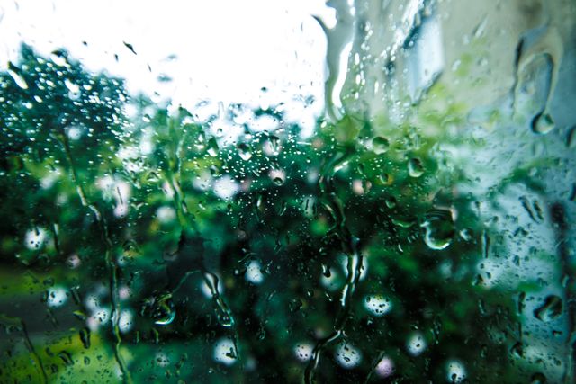 Rain Drops on Glass Surface during Daytime - Download Free Stock Photos Pikwizard.com
