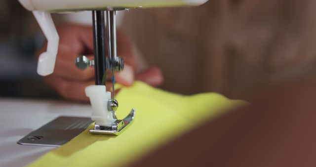 Close-Up of Sewing Machine Stitching Yellow Fabric - Download Free Stock Images Pikwizard.com