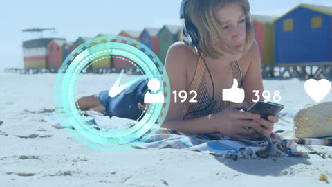 Girl Relaxing on Beach Engaging with Social Media
