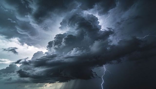Roaring Cumulonimbus Supercell Sending Jagged Lightning Across Open Plains at Dusk