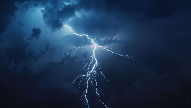 Dramatic Lightning Bolt Illuminating Night Storm Cloudscape