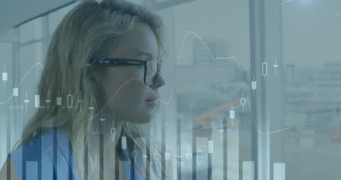 Businesswoman focusing on data screens, illustrating technology aiding business analysis. Useful for articles on business intelligence, digital transformation, and modern office environments.