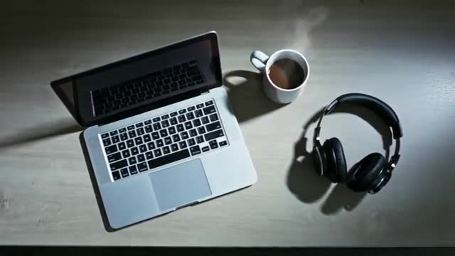 Serene Home Office Scene with Laptop and Coffee