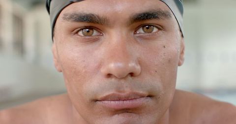 Close-up of focused male swimmer ready for competition