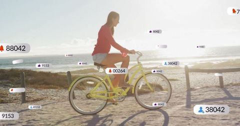 Woman Cycling on Coastal Trail with Social Media Engagement Icons