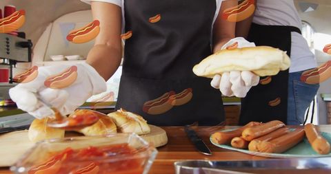 Outdoor Hot Dog Preparation with Chefs - Download Free Stock Images Pikwizard.com