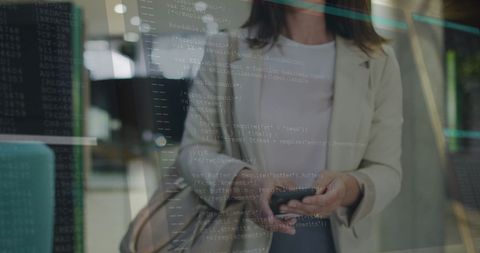 businesswoman engaged with digital interface overlain with code - Download Free Stock Images Pikwizard.com