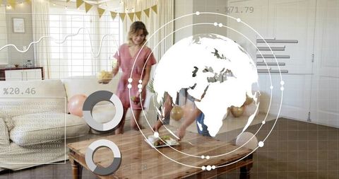 Two women celebrating at home decorating living room with balloons and digital overlay