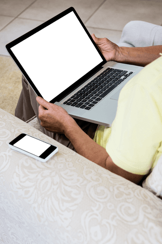 Man with Laptop Relaxing on Sofa with a Transparent Screen - Download Free Stock Videos Pikwizard.com