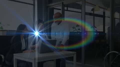 Business Team Collaborating with Digital Lens Flare Effect