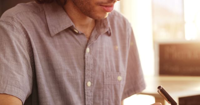 Young Man Working on Digital Tablet in Bright Office Light - Download Free Stock Images Pikwizard.com