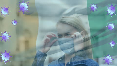 Woman Wearing Face Mask amidst Virus Cell Animation
