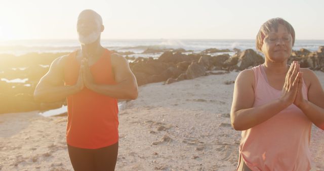 Senior Couple Practicing Yoga at Beach Sunset - Download Free Stock Images Pikwizard.com