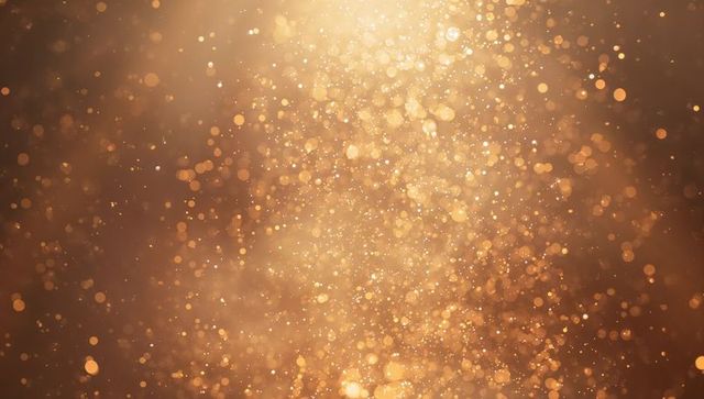 Glowing Golden Bokeh Backdrop with Sparkling Dust, Warm Metallic Glow and Abstract Light Particles