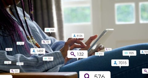 woman engaging with social media on tablet with floating icons - Download Free Stock Images Pikwizard.com