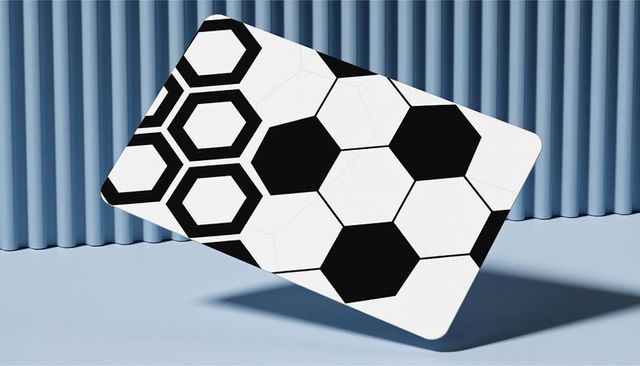 Floating rounded panel showing black-and-white hexagon pattern over pale blue minimalist backdrop