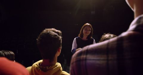 Female Conductor Rehearsing Teenage Choir on Stage - Download Free Stock Images Pikwizard.com