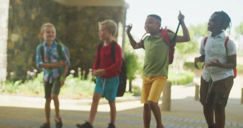 Joyful Boys Walking and Talking Outside School Building - Download Free Stock Images Pikwizard.com
